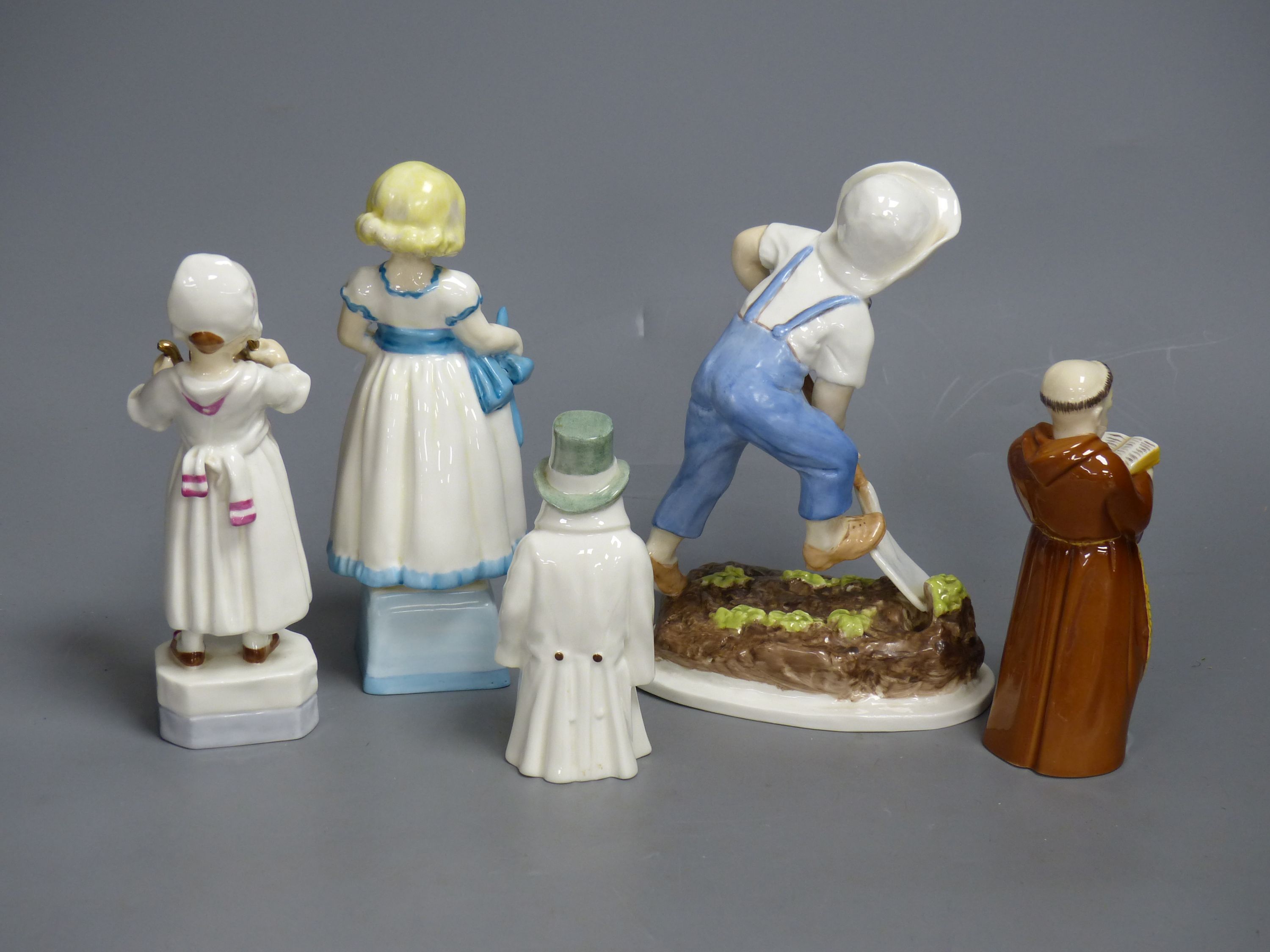 Three Royal Worcester figures, 'Saturday's Child', 'Monday's Child' and 'Polly Put the Kettle On' and two candle snuffers